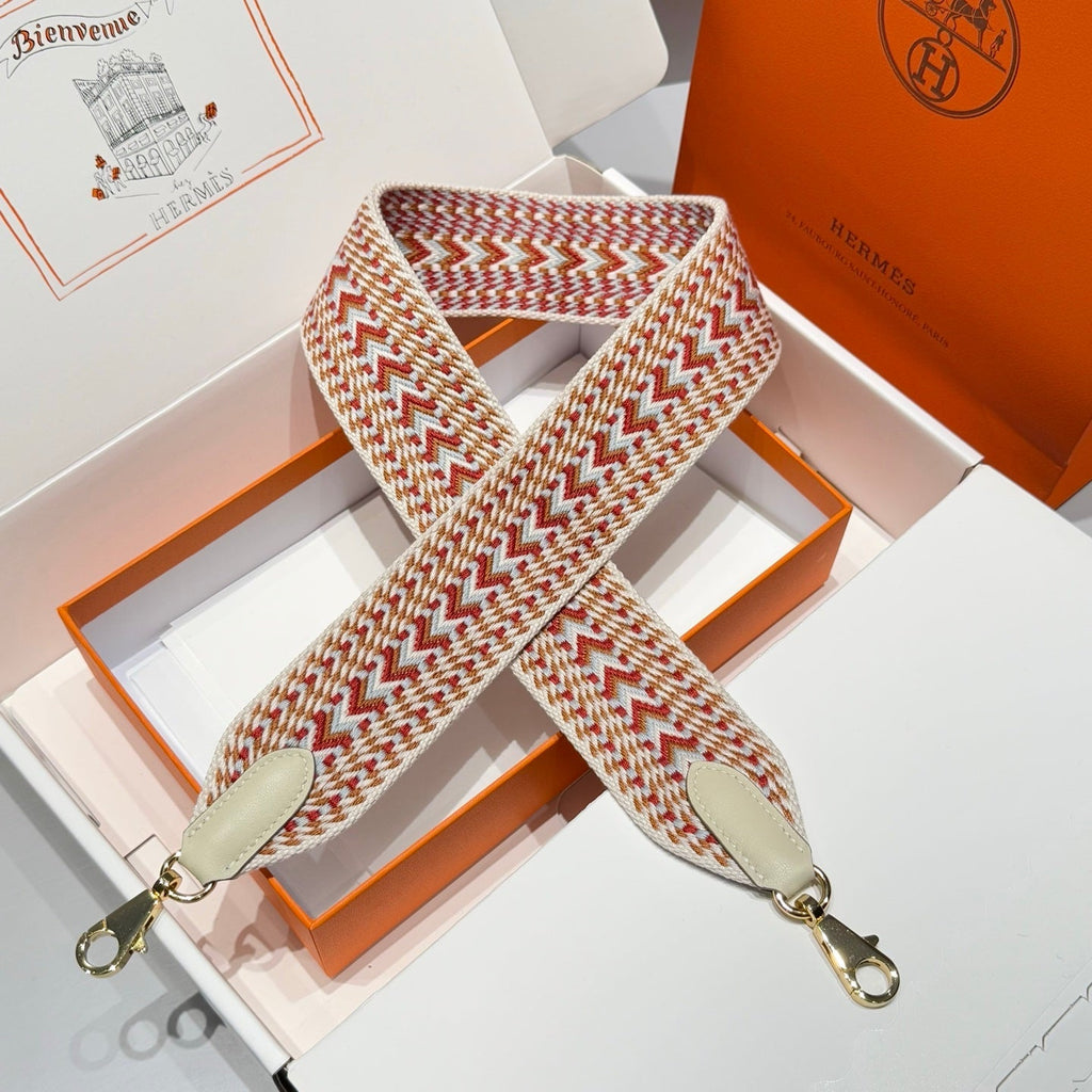 25S HERMES BAG STRAP ORANGE AND RED PATTERN 85 IN CANVAS GOLD HARDWARE