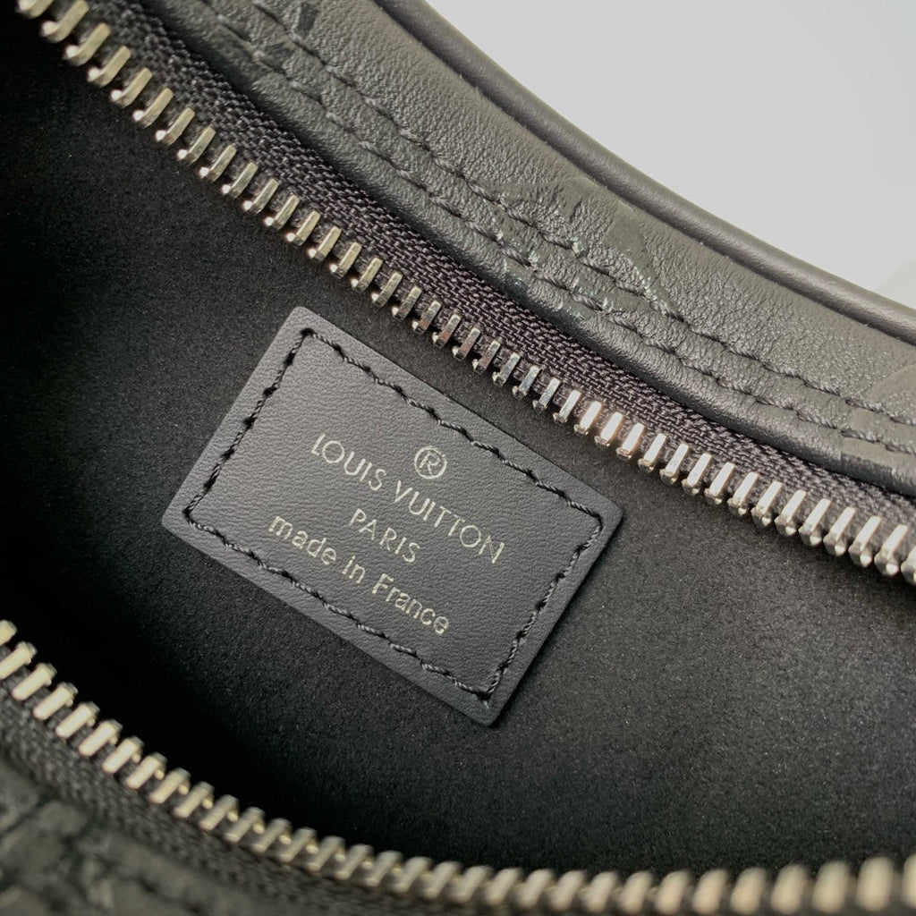 LOOP HOBO 23 IN BLACK MONOGRAM EMPREINTE CALFSKIN EMBOSSED LOGO