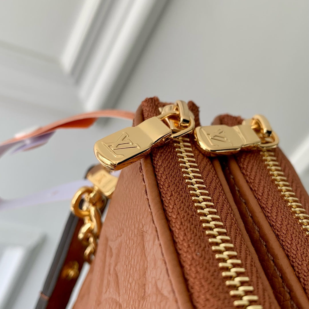 LIV POCHETTE BAG 24 IN COGNAC BROWN MONOGRAM EMPREINTE LEATHER