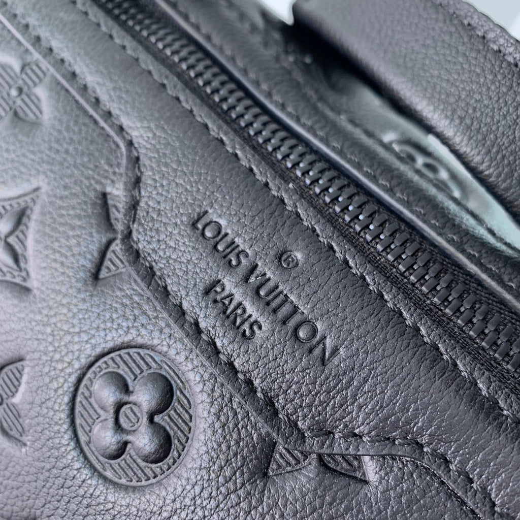 GETAWAY BACKPACK 50 IN BLACK MONOGRAM ECLIPSE CANVAS AND CALFSKIN EMBOSSED LOGO