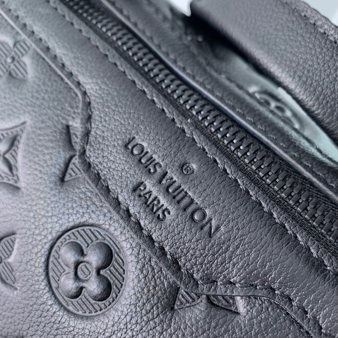 GETAWAY BACKPACK 50 IN BLACK MONOGRAM ECLIPSE CANVAS AND CALFSKIN EMBOSSED LOGO