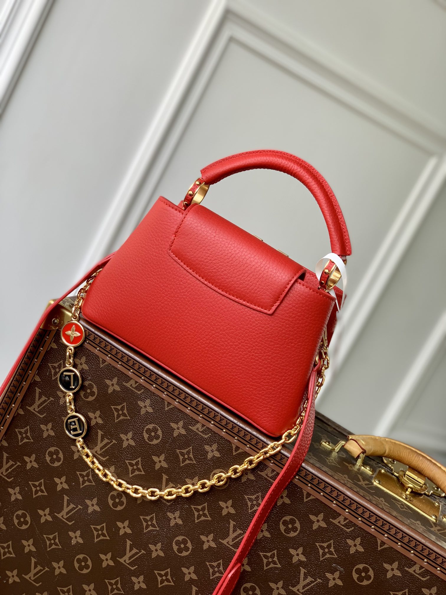 CAPUCINES MINI 23 IN RED TAURILLON GOLD HARDWARE