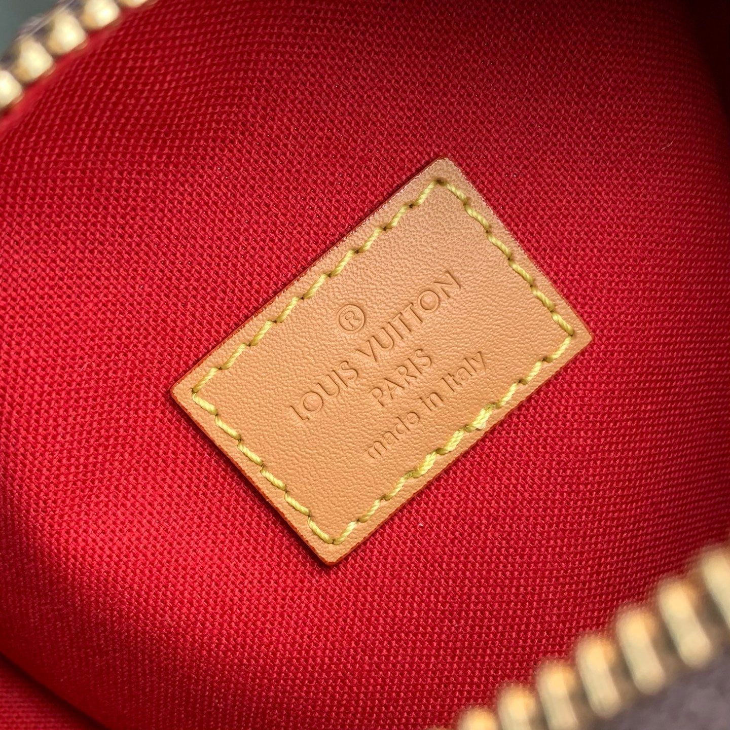 NANO SPEEDY DATING 18 IN BROWN COATED CANVAS GOLD HARDWARE