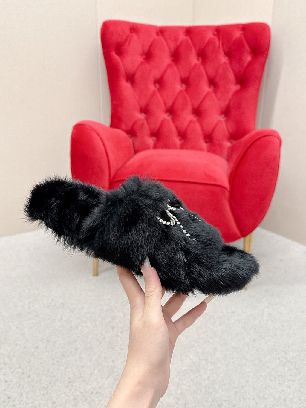 BALENCIAGA 25S SOFT FUR SLIPPERS IN BLACK FUR WITH RHINESTONE BOW