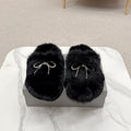 BALENCIAGA 25S SOFT FUR SLIPPERS IN BLACK FUR WITH RHINESTONE BOW