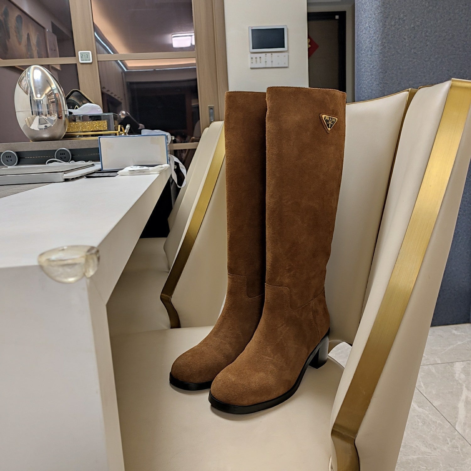 KNEE BOOTS WITH TRIANGLE LOGO IN CAMEL SUEDE
