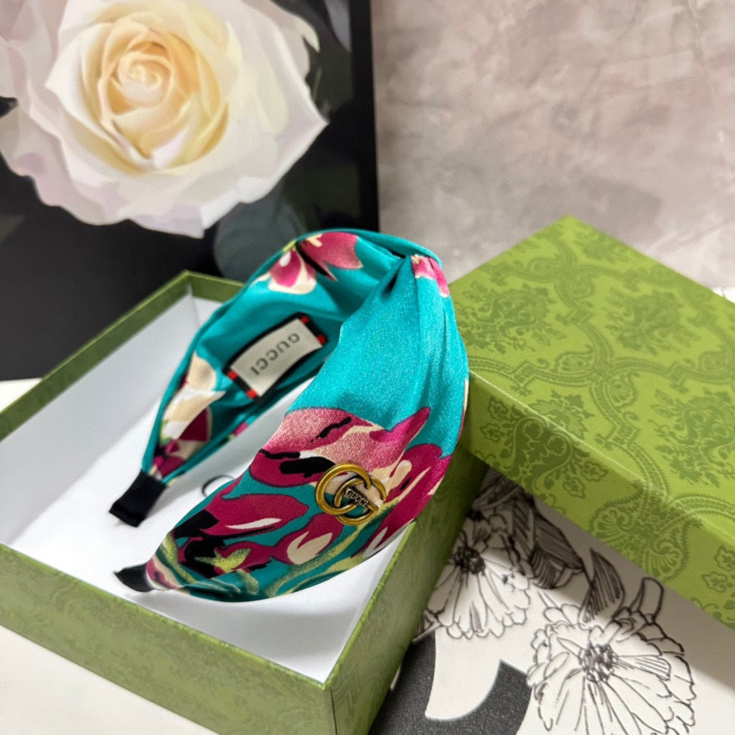 HAIRBAND IN TURQUOISE GREEN FLORAL SILK 252676