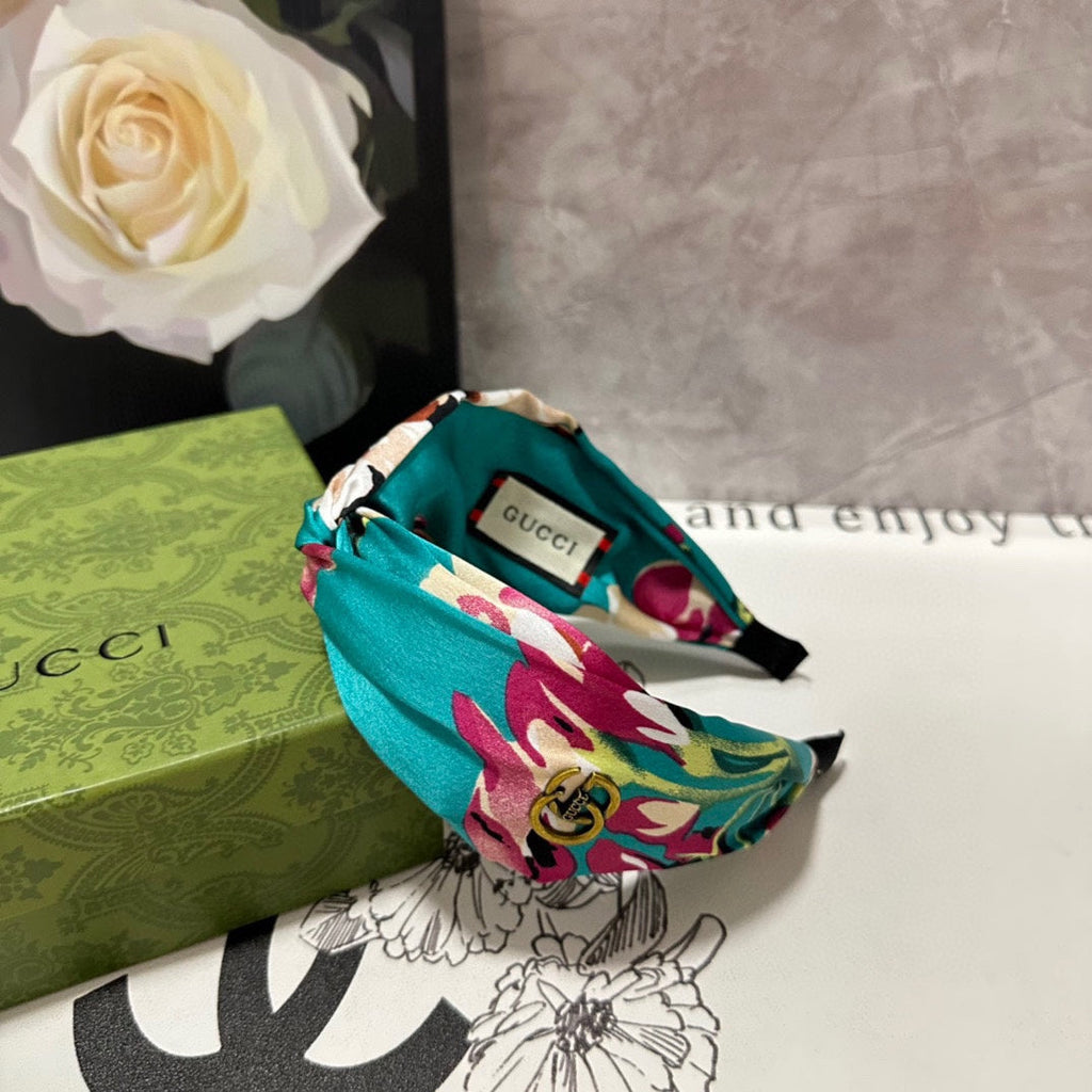 HAIRBAND IN TURQUOISE GREEN FLORAL SILK 252676