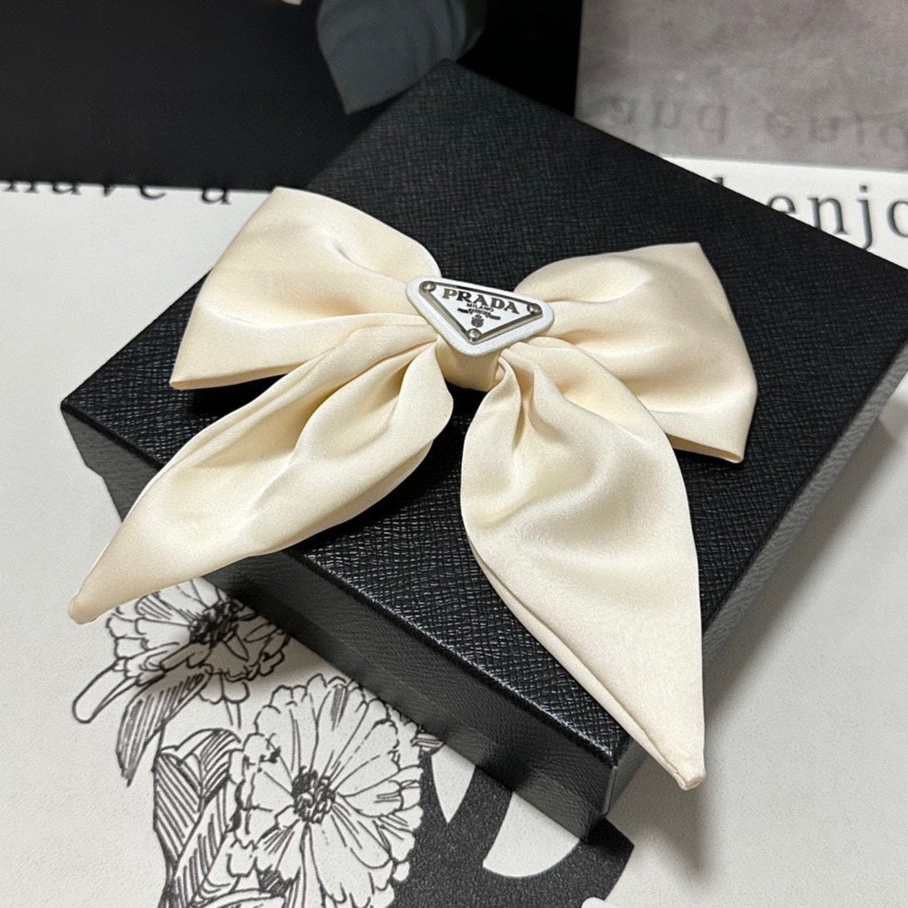 BOW-KNOT HAIR CLIP IN EGG SHELL SILK 358294