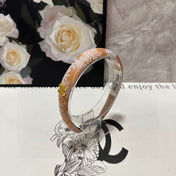 HEADBAND WITH GARNITURE PRINT IN TIGER EYE ORANGE SILK 432822