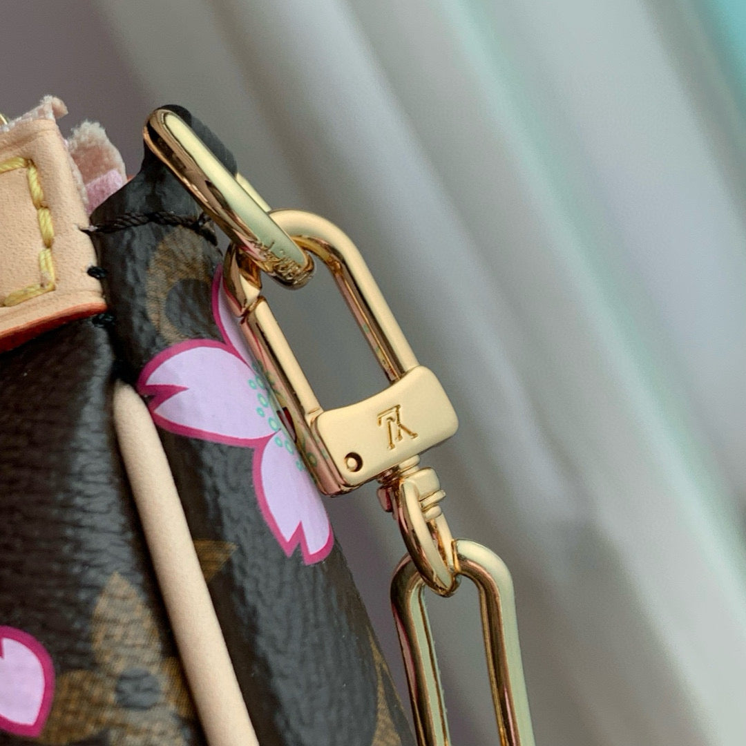 POCHETTE ACCESSOIRES BAG 22 IN SAKURA BROWN MONOGRAM COATED CANVAS