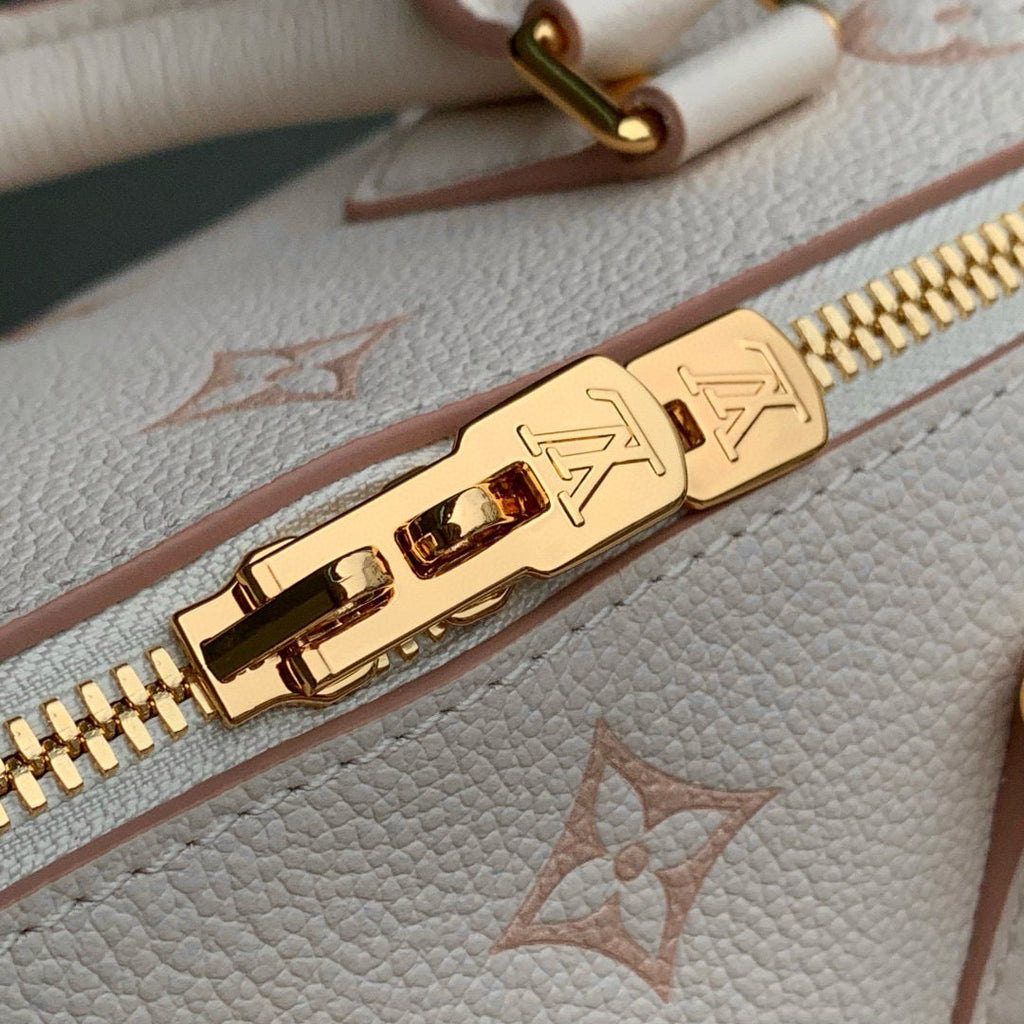 SPEEDY BANDOULIÈRE 20.5 IN LIGHT PINK MONOGRAM EMPREINTE CANVAS