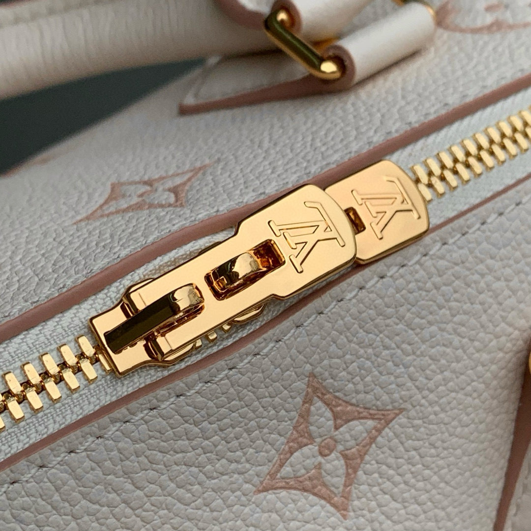 SPEEDY BANDOULIÈRE 20.5 IN LIGHT PINK MONOGRAM EMPREINTE CANVAS