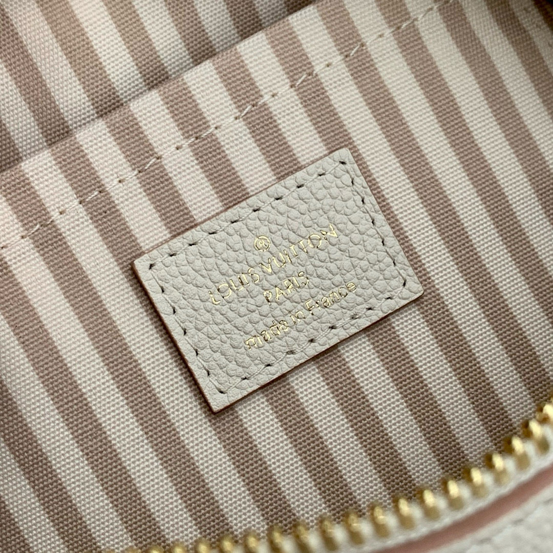 SPEEDY BANDOULIÈRE 20.5 IN LIGHT PINK MONOGRAM EMPREINTE CANVAS