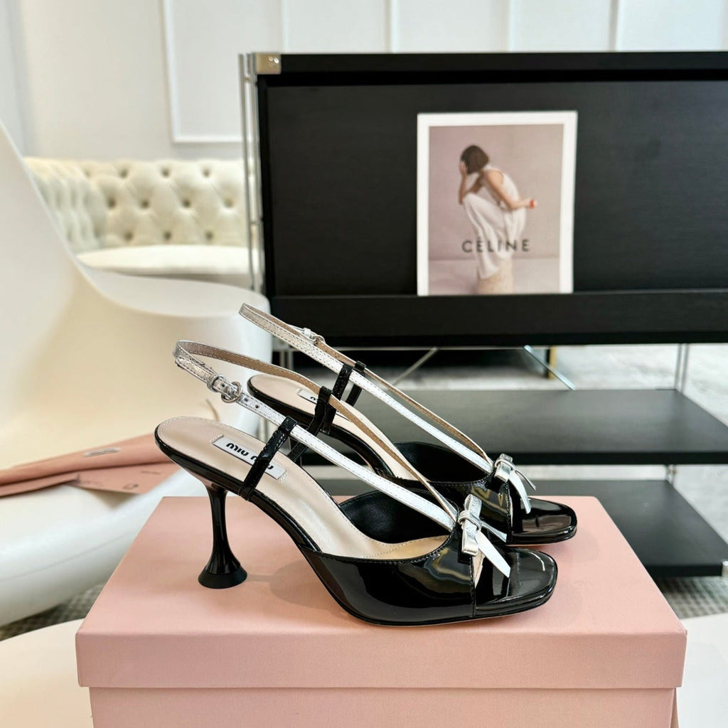 Black High Heels With Silver Bow