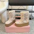 SNOW ANKLE BOOTS IN COSMIC LATTE SHEARLING