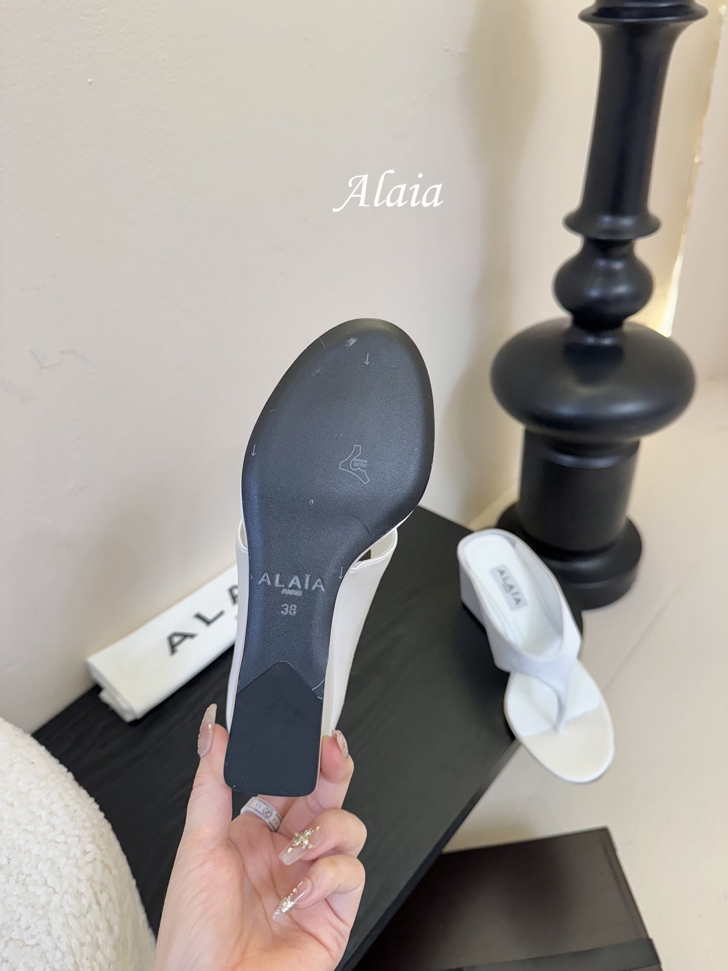 ALAIA WEDGE THONG SANDALS 25S IN WHITE SATIN