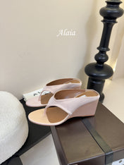 ALAIA WEDGE THONG SANDALS 25S IN BLUSH BEIGE SATIN