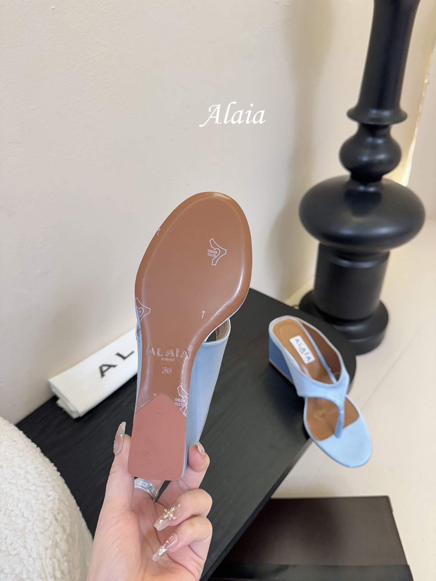 ALAIA WEDGE THONG SANDALS 25S IN BLUE SATIN