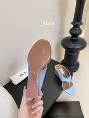 ALAIA WEDGE THONG SANDALS 25S IN BLUE SATIN