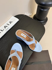 ALAIA WEDGE THONG SANDALS 25S IN BLUE SATIN