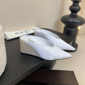 ALAIA HIGH MULES 25S IN WHITE SATIN