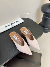 ALAIA HIGH MULES 25S IN BLUSH BEIGE SATIN