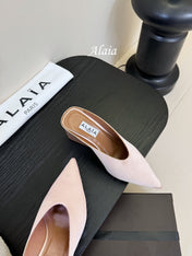 ALAIA HIGH MULES 25S IN BLUSH BEIGE SATIN