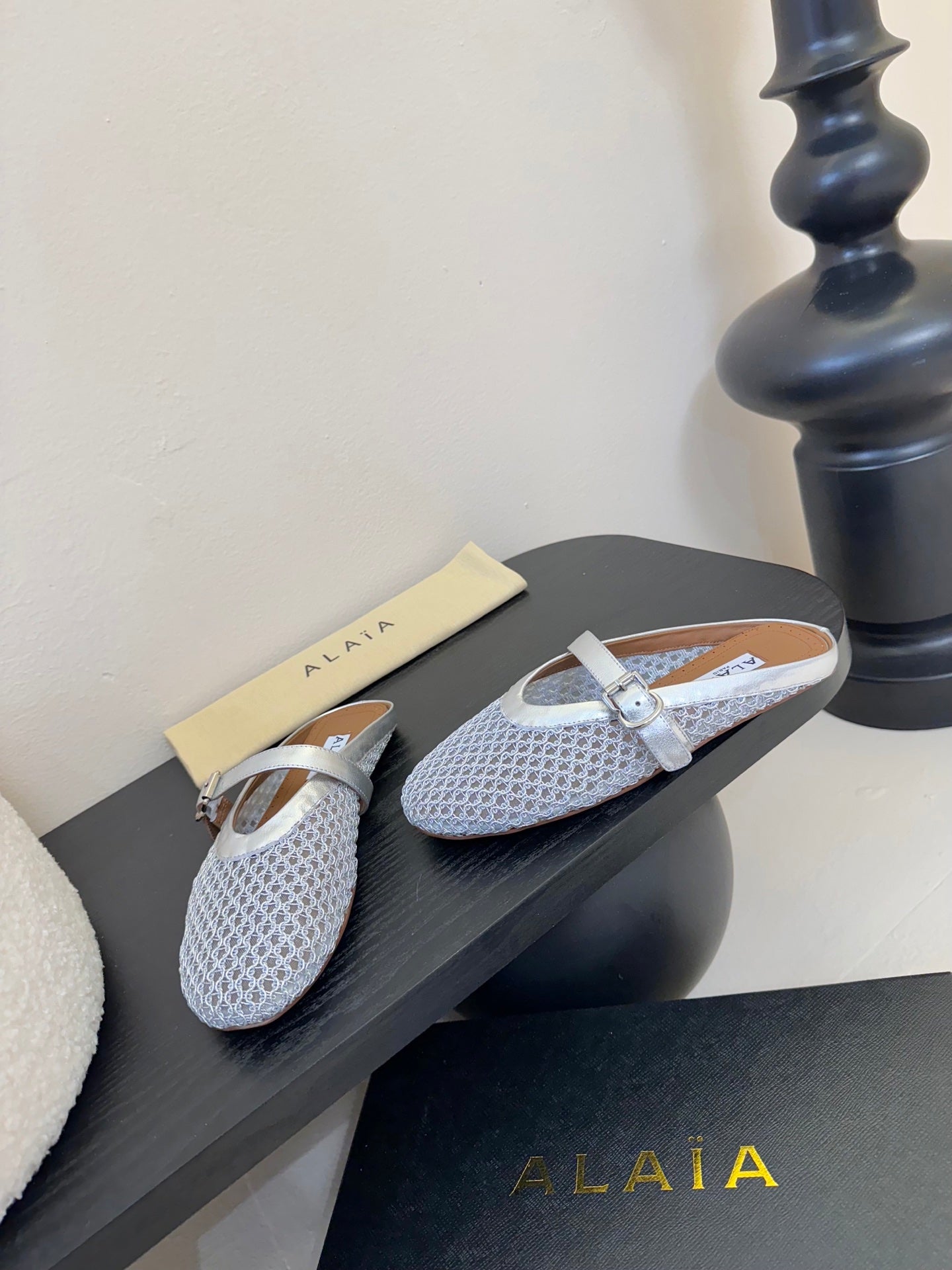 ALAIA FLAT MULES 25S IN GREY MIX SILVER WOVEN MESH