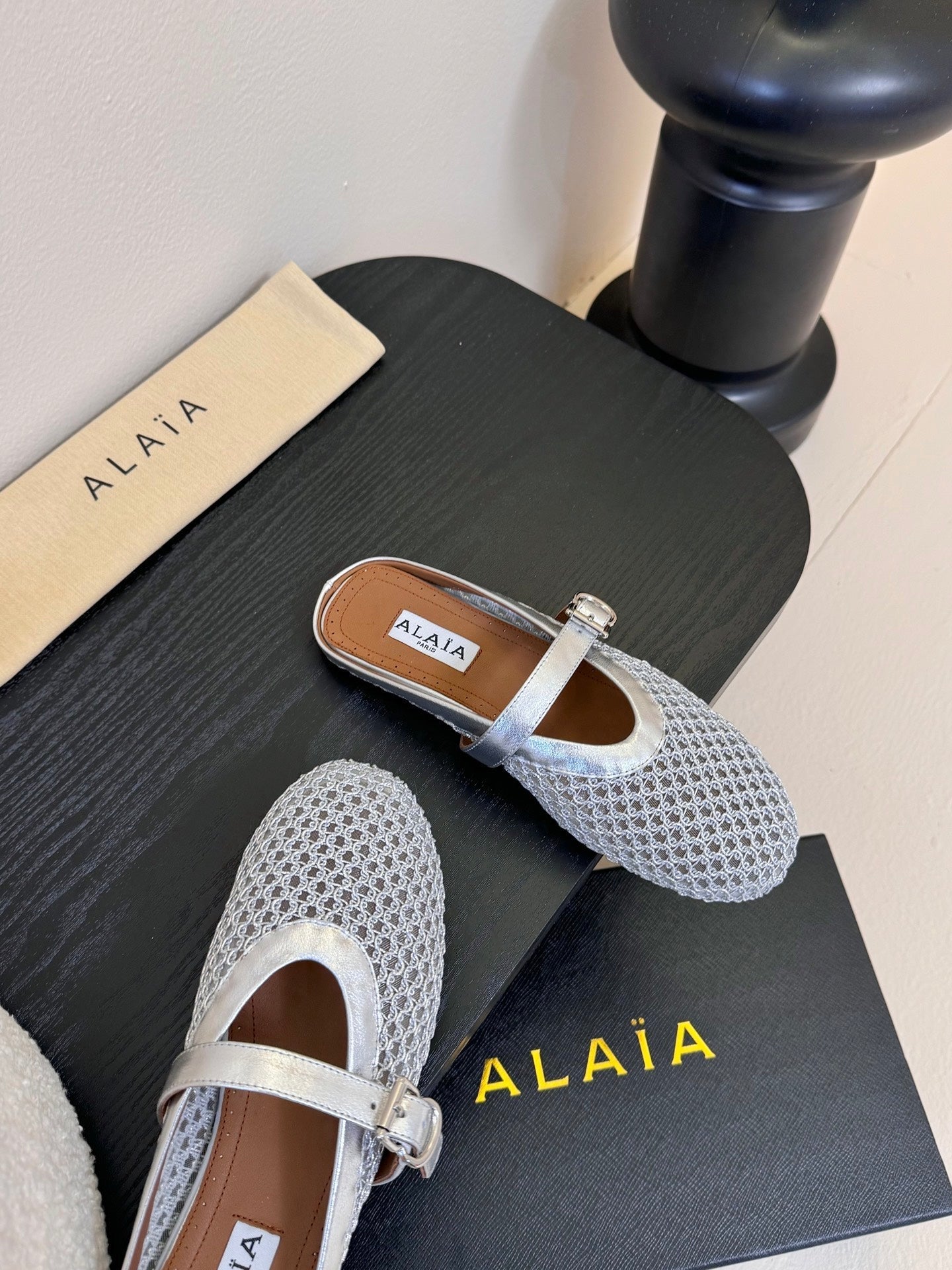 ALAIA FLAT MULES 25S IN GREY MIX SILVER WOVEN MESH
