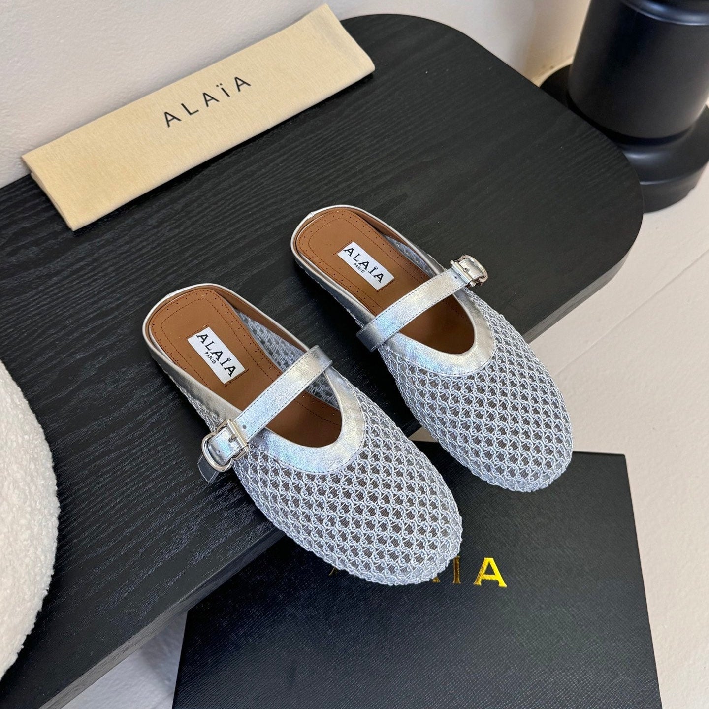 ALAIA FLAT MULES 25S IN GREY MIX SILVER WOVEN MESH