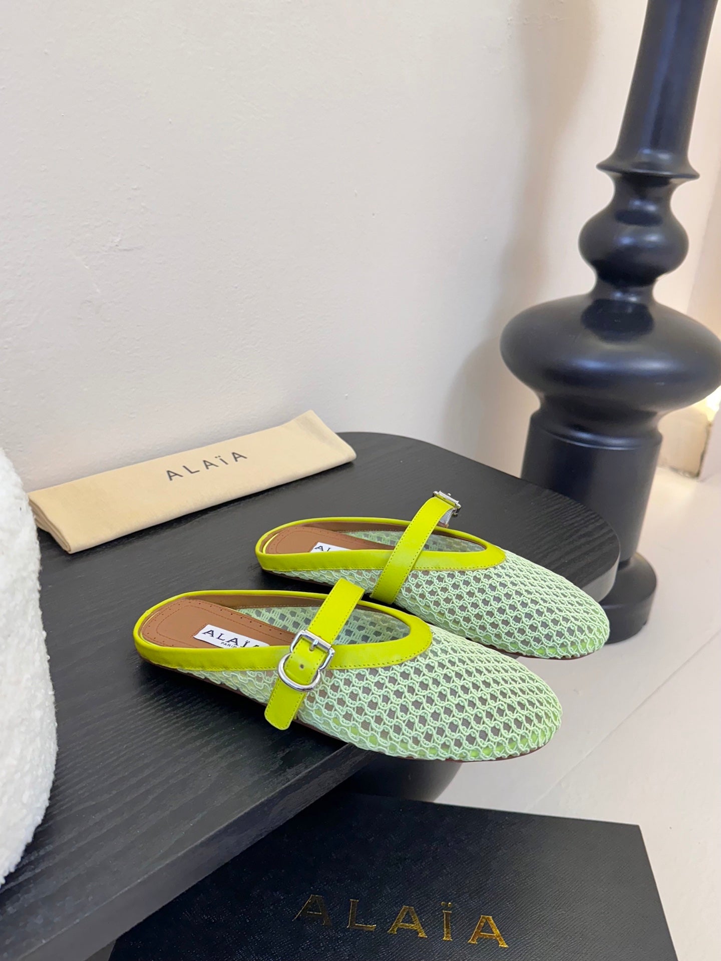 ALAIA FLAT MULES 25S IN MINT GREEN WOVEN MESH