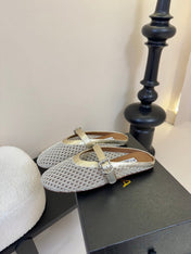 ALAIA FLAT MULES 25S IN GREY MIX GOLD WOVEN MESH
