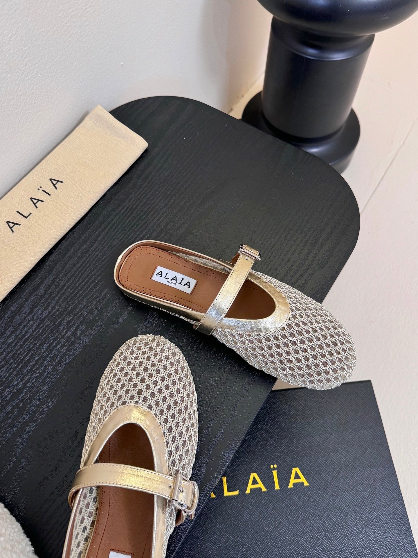 ALAIA FLAT MULES 25S IN GREY MIX GOLD WOVEN MESH