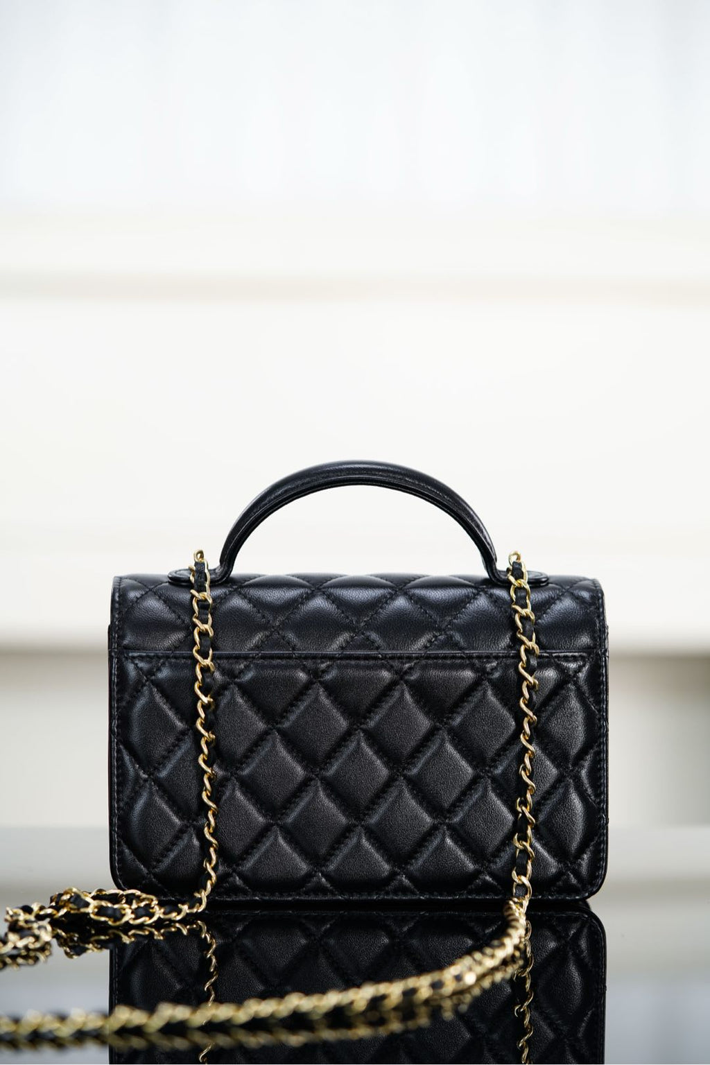 CHANEL 25S TOP HANDLE FLAP 19 CM IN BLACK LAMBSKIN WITH GOLD HARDWARE