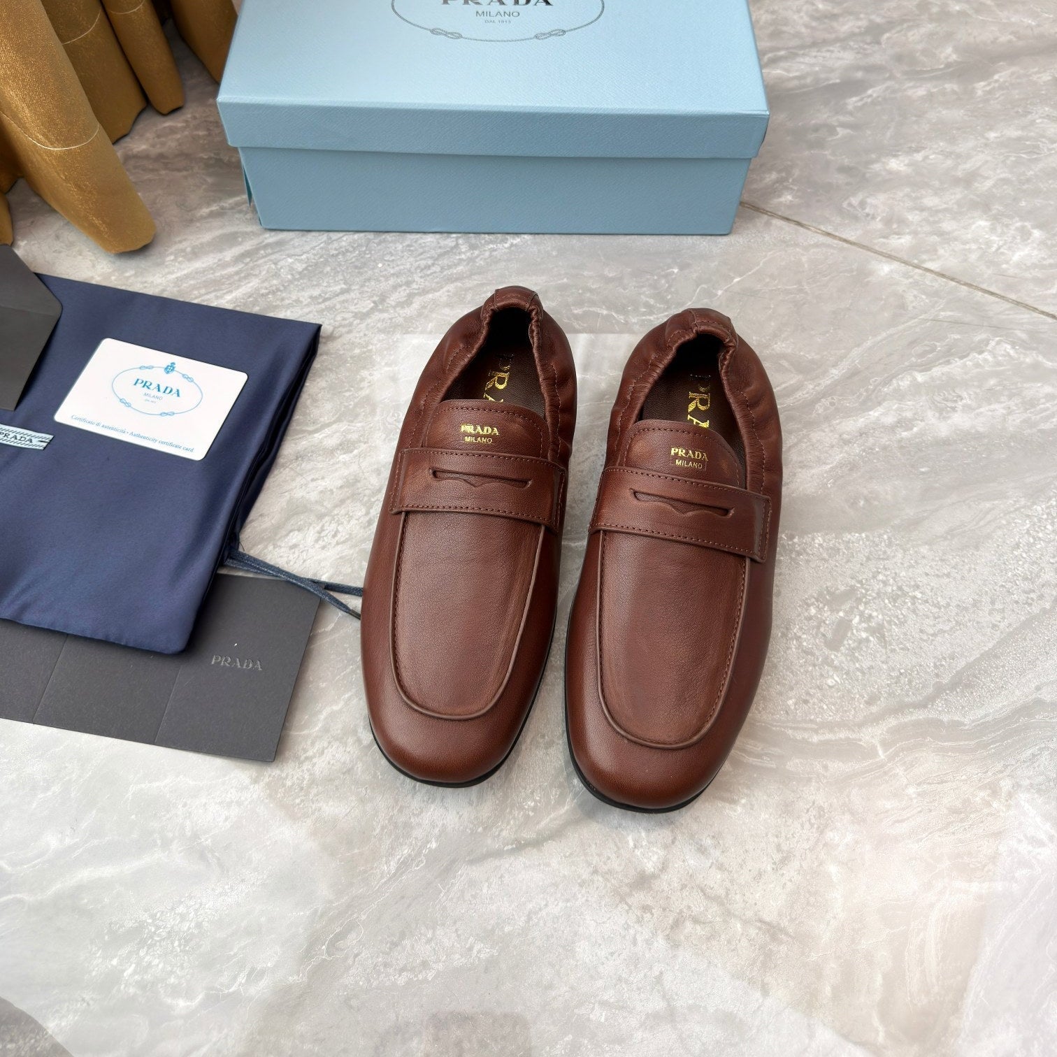 PRADA 25S LOAFERS IN BROWN CALFSKIN
