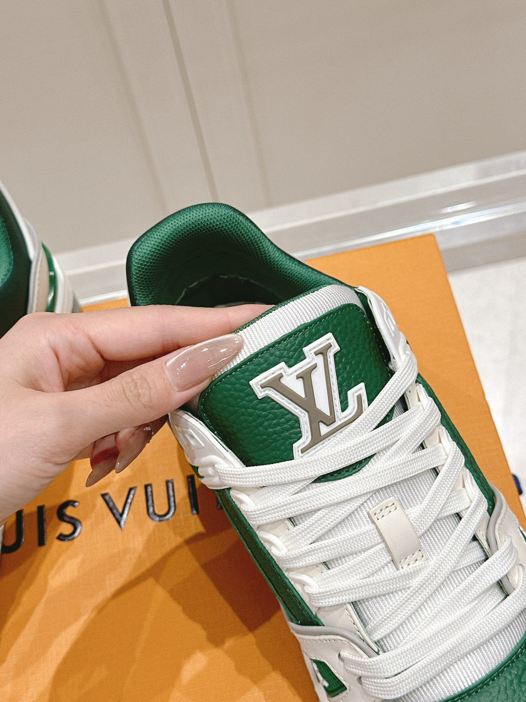 LV TRAINER SNEAKER IN BORNEO GREEN GRAINED CALFSKIN