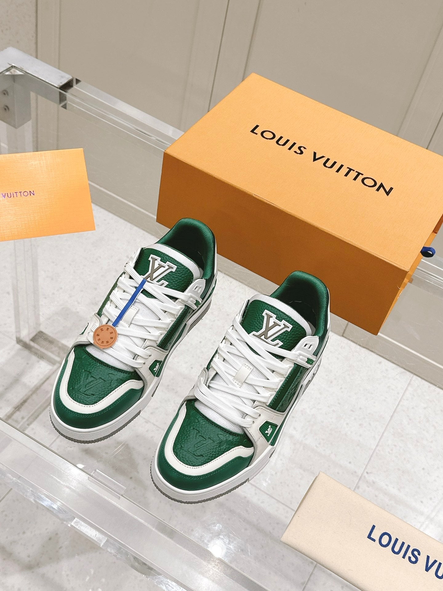 LV TRAINER SNEAKER IN BORNEO GREEN GRAINED CALFSKIN