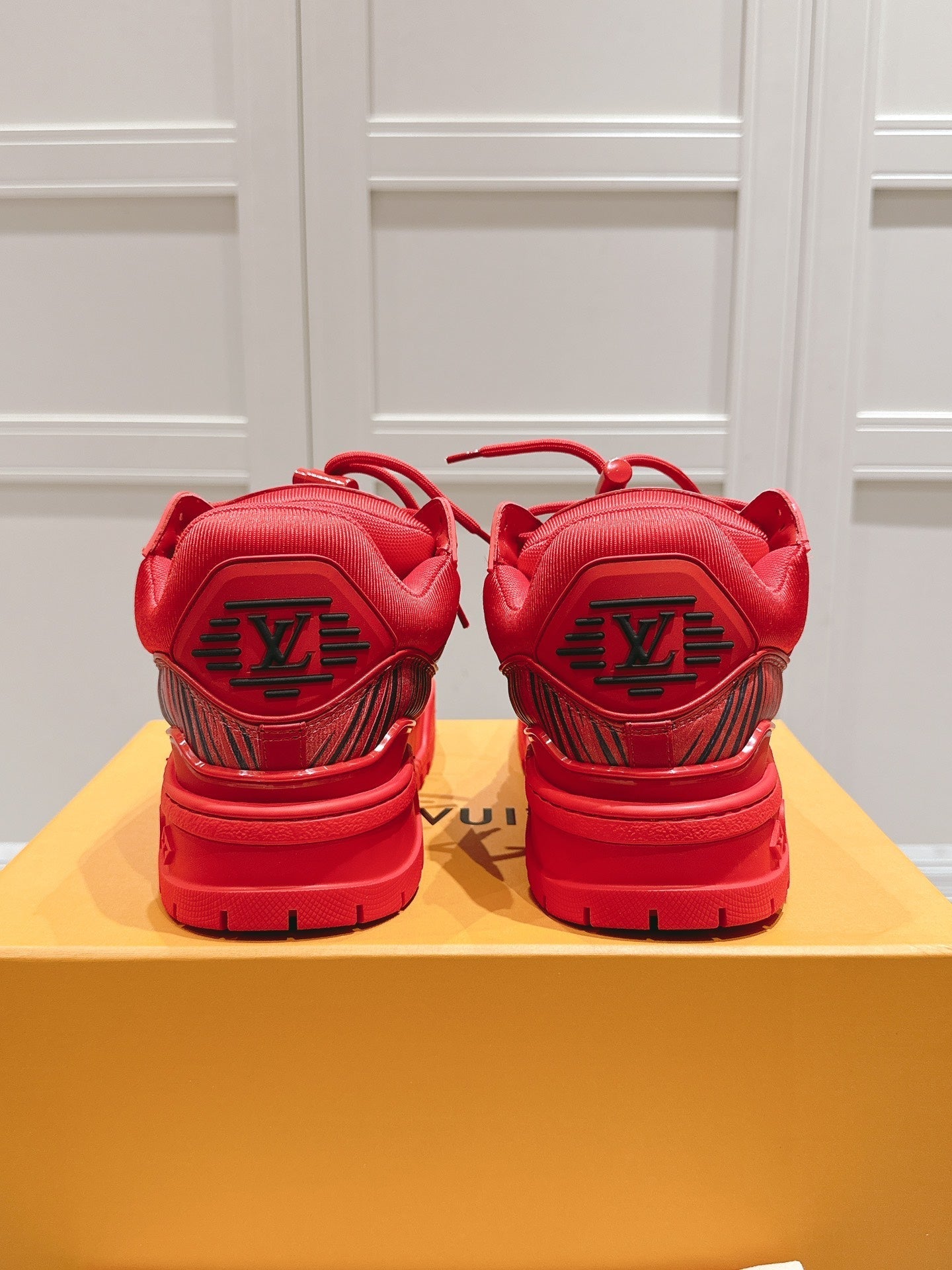 LV TRAINER MAXI LV X PARK SEO-BO IN RUBY RED CALFSKIN