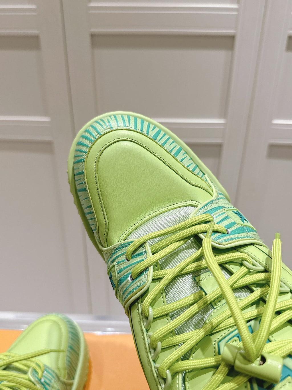 LV TRAINER MAXI LV X PARK SEO-BO IN PEAR GREEN CALFSKIN