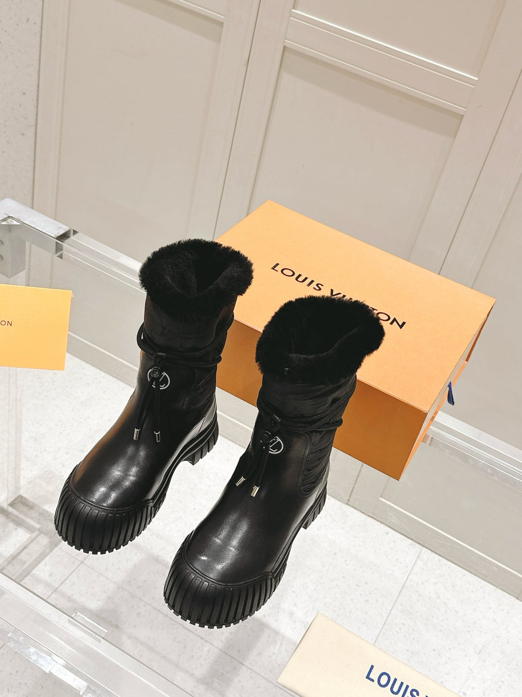 RUBY FLAT ANKLE BOOT IN BLACK CALFSKIN AND MONOGRAM NYLON