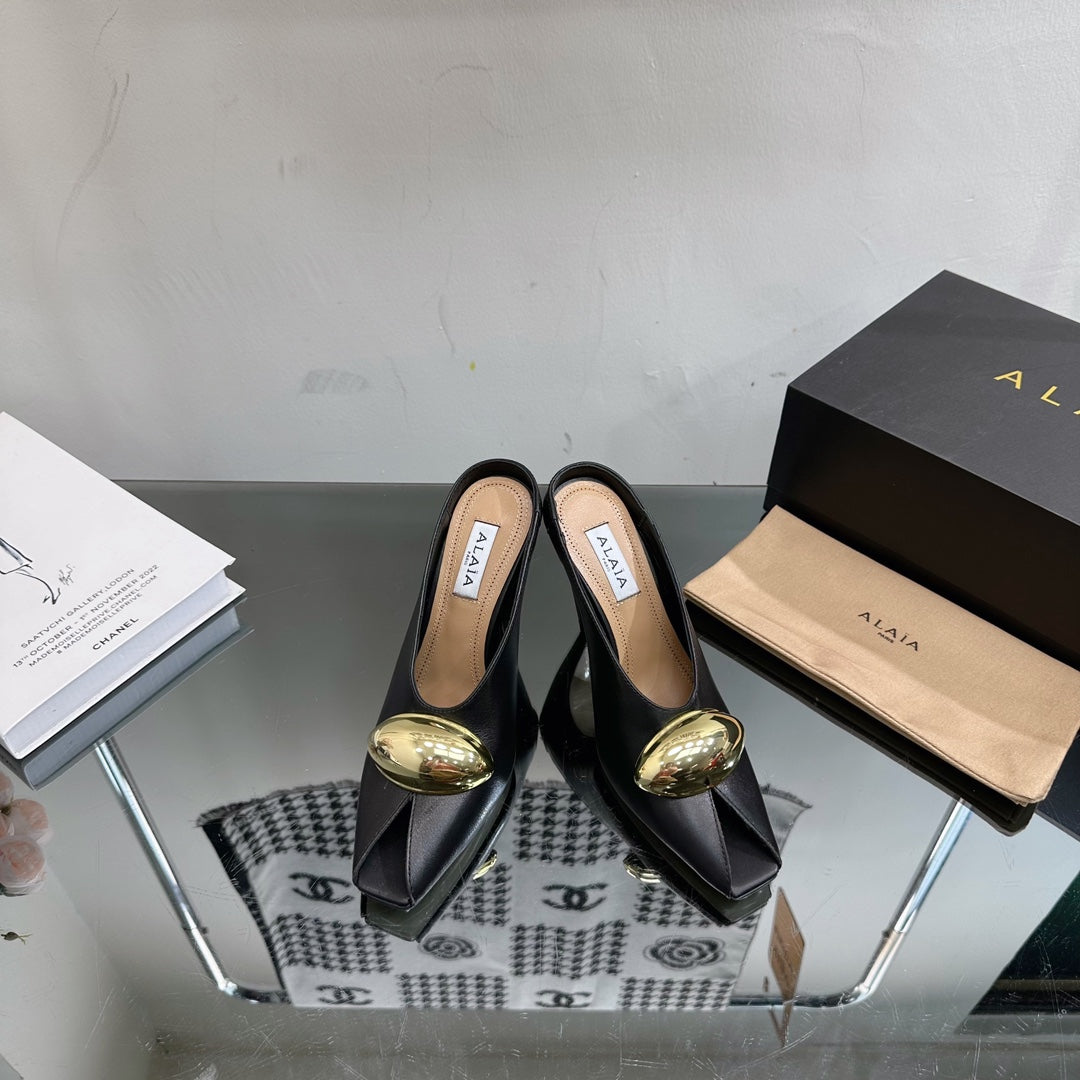 ALAIA AZZEDINE HIGH HEELS IN BLACK CALFSKIN WITH GOLD HARDWARE