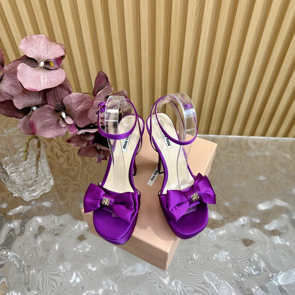 HIGH BOW PLATFORM IN VIOLET SILK