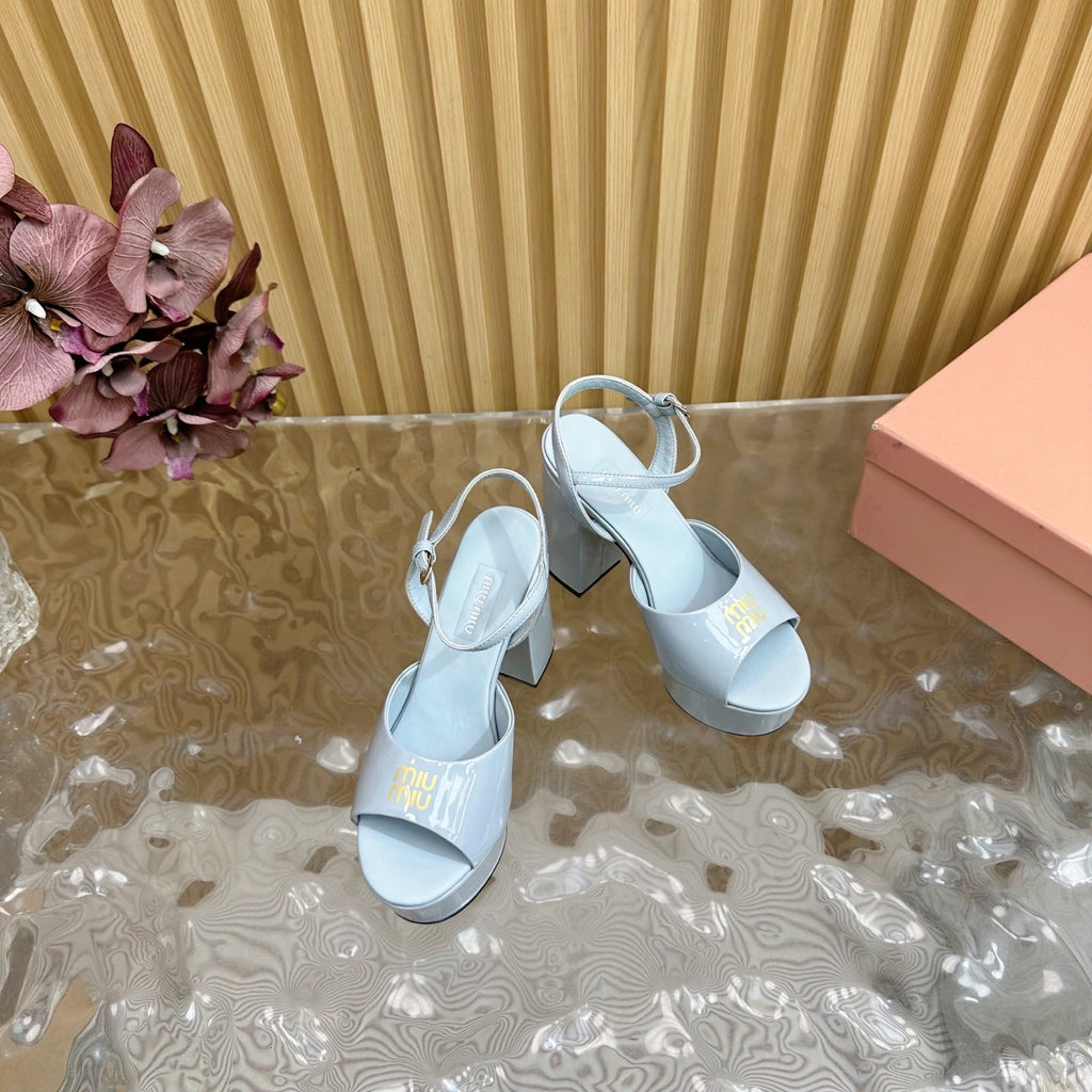 PLATFORM HEELS IN BABY BLUE PATENT CALFSKIN GOLD LOGO IN STRAP