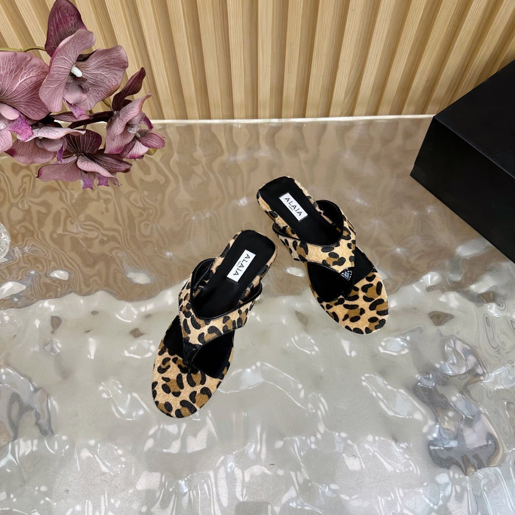 ALAIA PLATFORM THONG SANDALS 25S IN LEOPARD PONY HAIR LEATHER