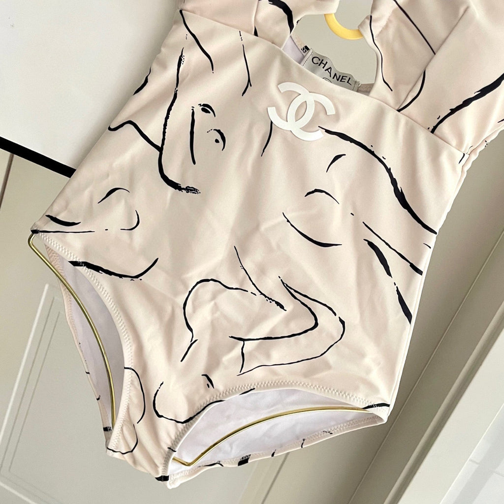 CC BIKINI SWIMSUIT SET IN CREAMY WHITE MIXED WITH CURVED BLACK DETAIL 608919