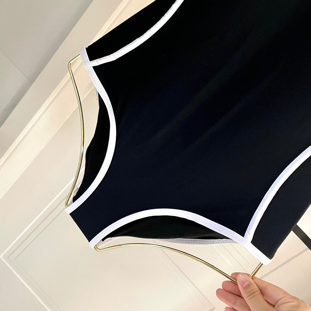 SWIMSUIT BODYSUIT IN BLACK AND WHITE STRIPED 627831