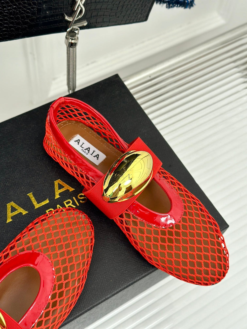 ALAIA MARY JANE SHOES IN CHERRY RED MESH WITH GOLD HARDWARE