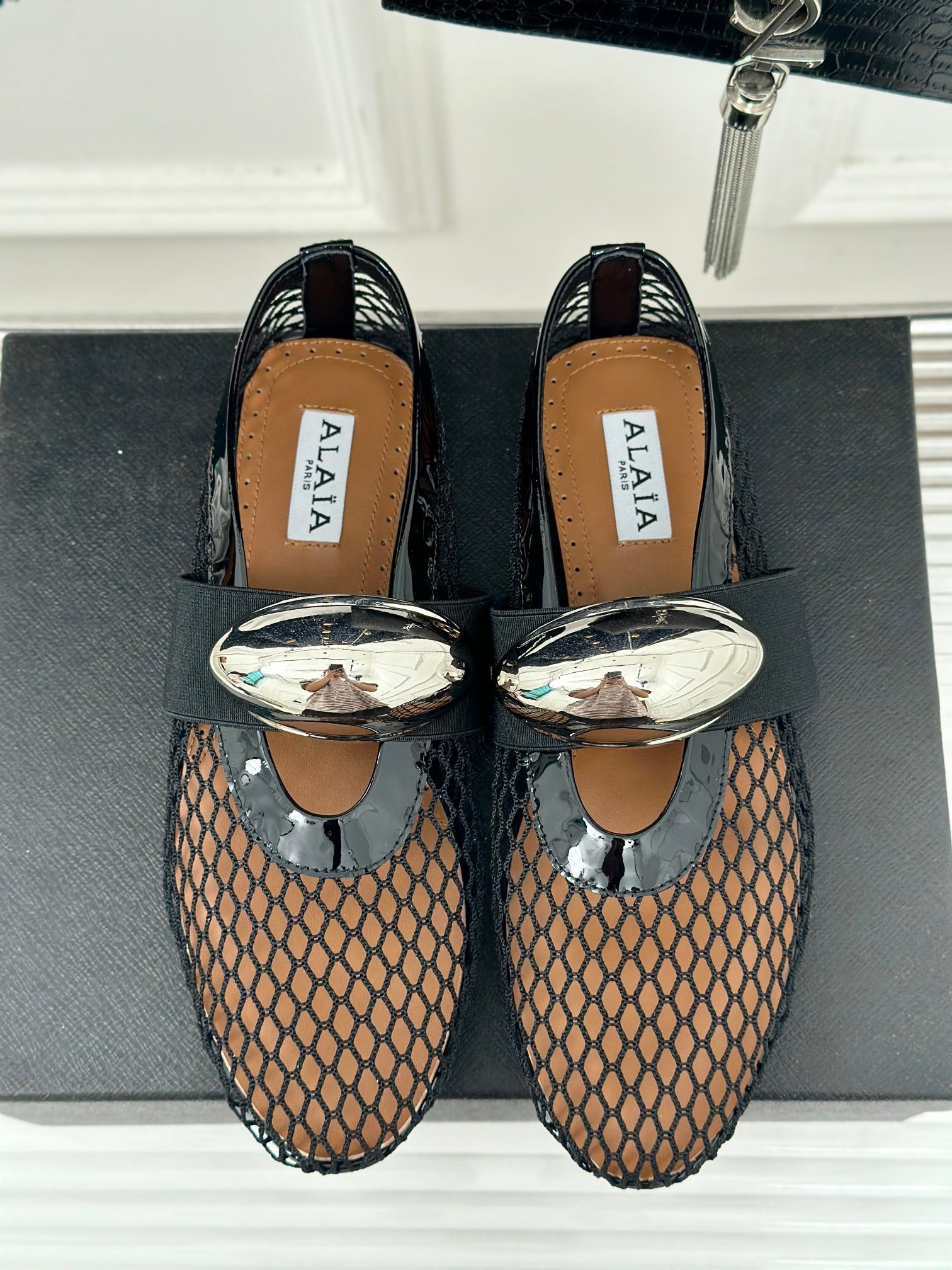 ALAIA MARY JANE SHOES IN BLACK MESH WITH SILVER HARDWARE