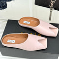 ALAIA FLAT MULE IN LIGHT PINK LAMBSKIN